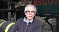 Portret meneer Viegen bij de brouwerij