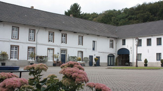 Binnenplaats hoeve De Kruisstraat in Rimburg - Richard Barendse